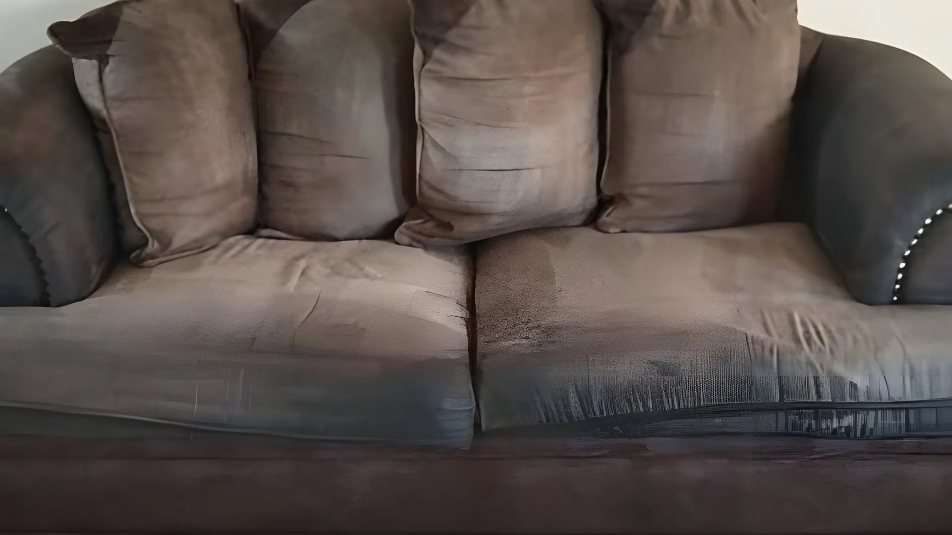 Brown pillow-back couch before reupholstery