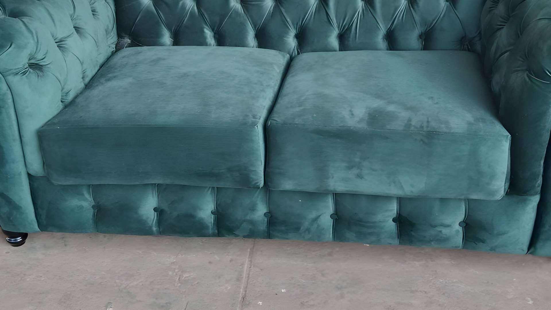 Chesterfield re-covered in teal velvet with deep buttoning
