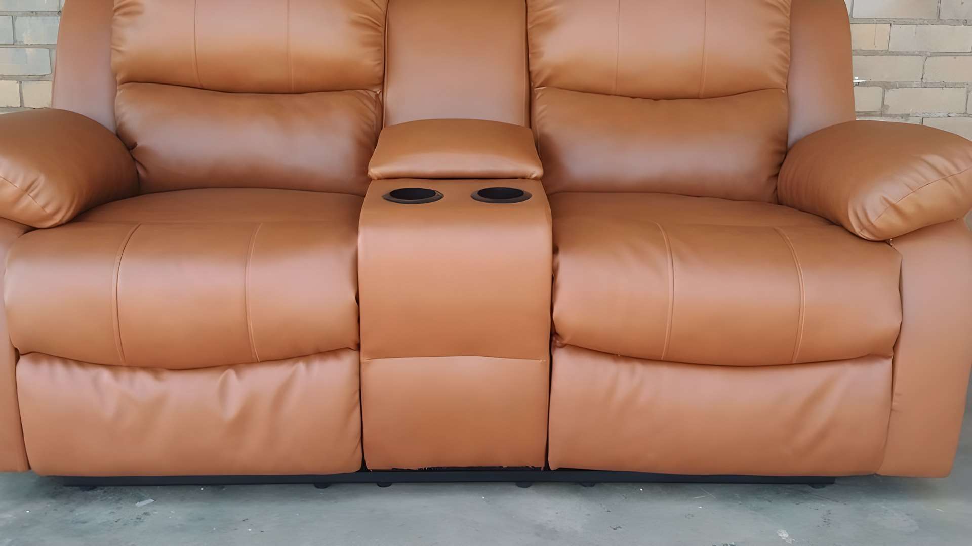 Recliner re-covered in tan after the old black cover peeled