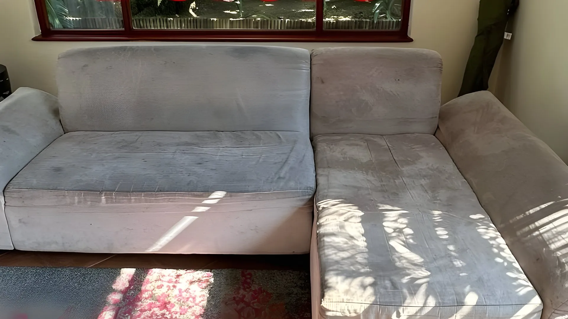 Before: Grey corner couch, re-covered in burgundy velvet