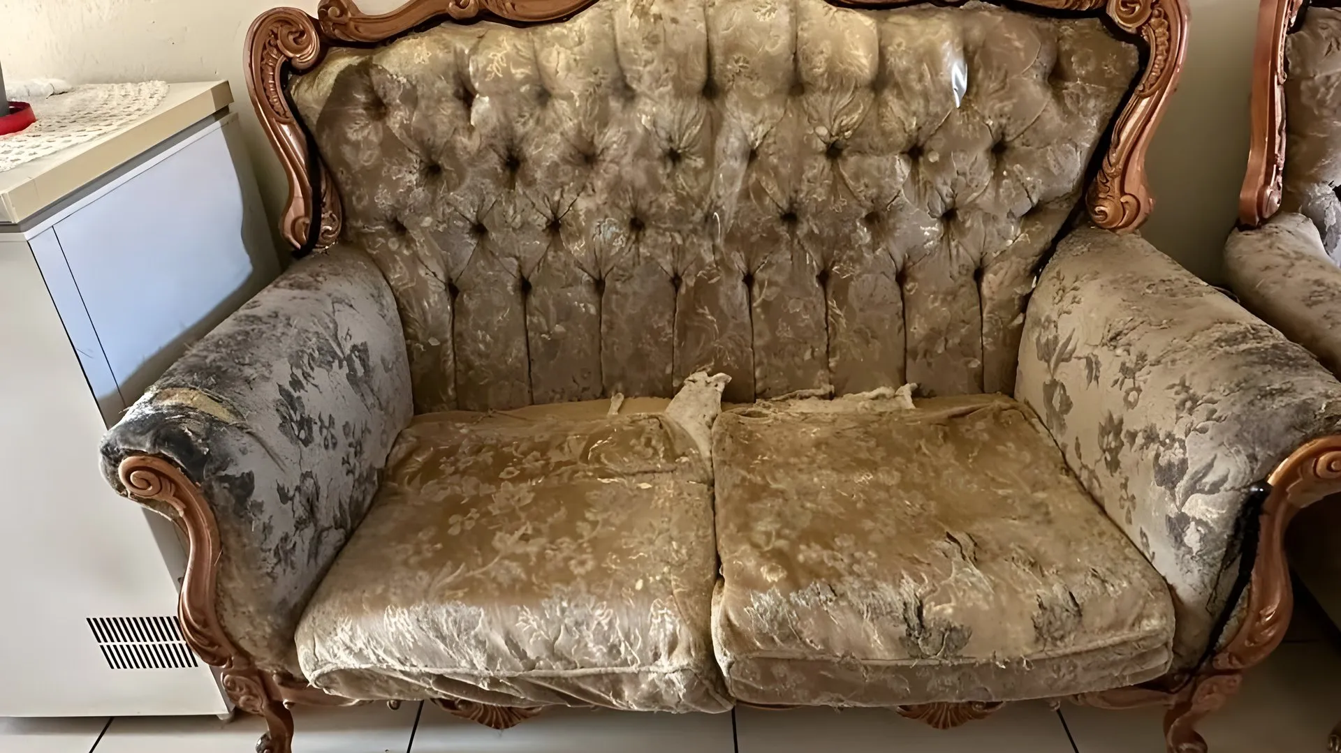 Before: Stained carved settee, re-covered in silver-grey