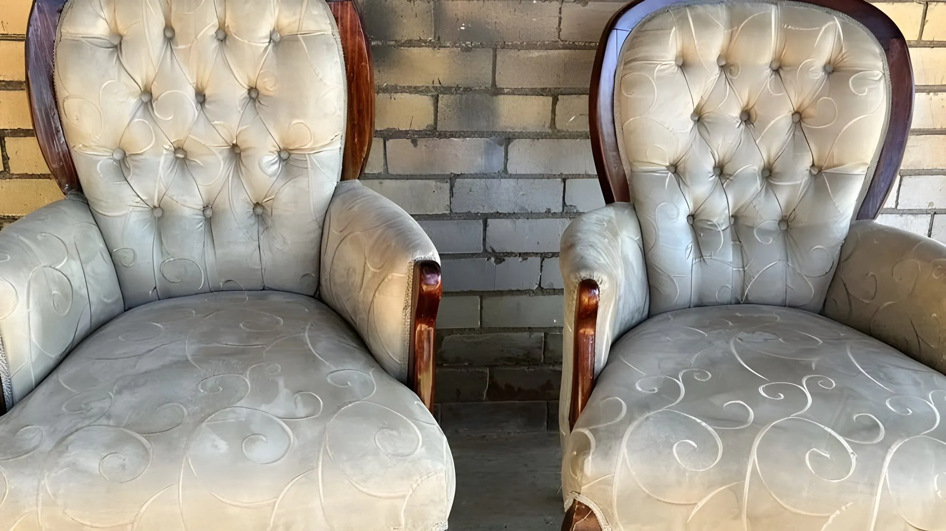 Before: A pair of armchairs, re-covered in cream