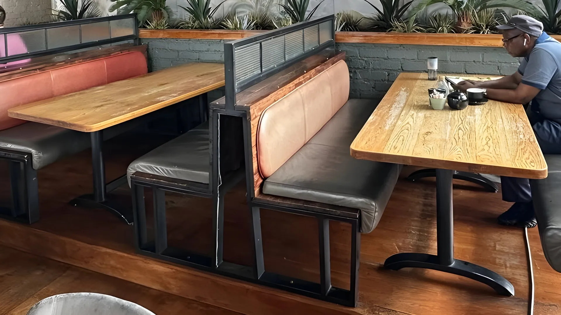 Before: Restaurant booths, re-covered for daily service