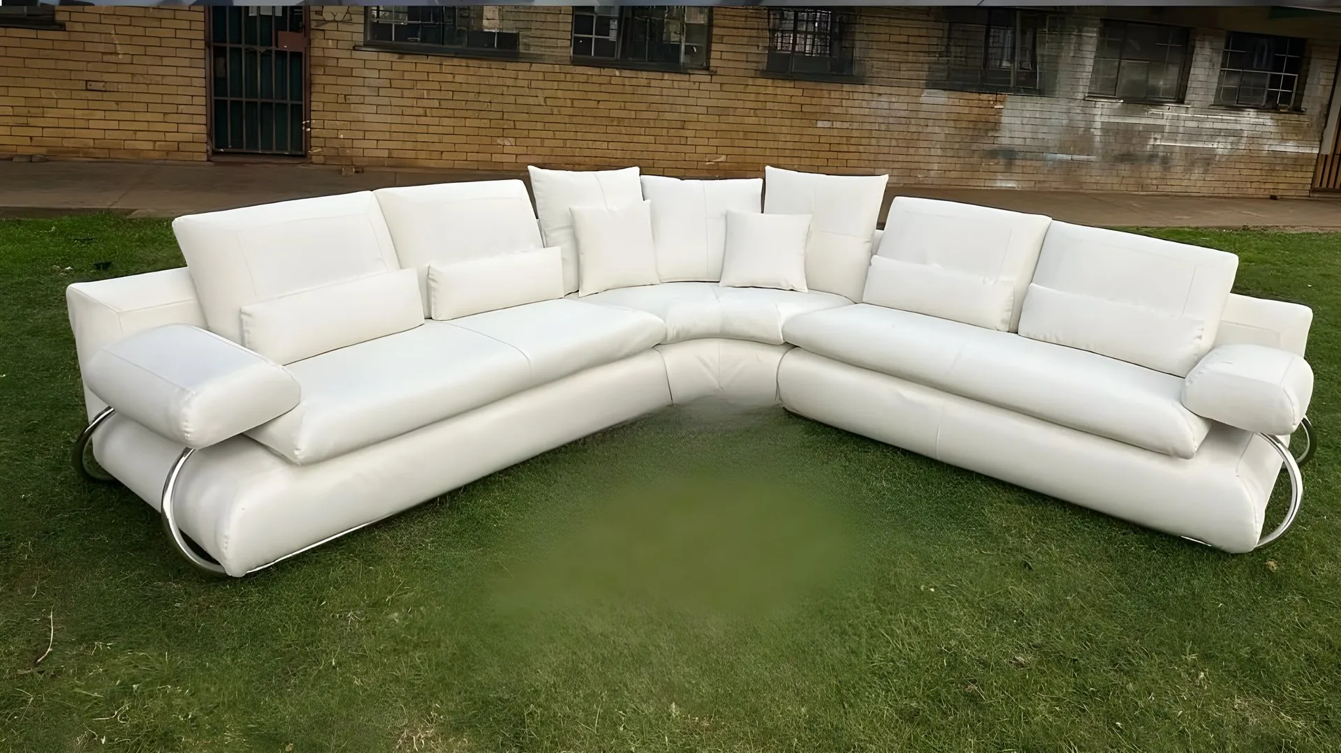 After: Stained cream corner suite, re-covered in white