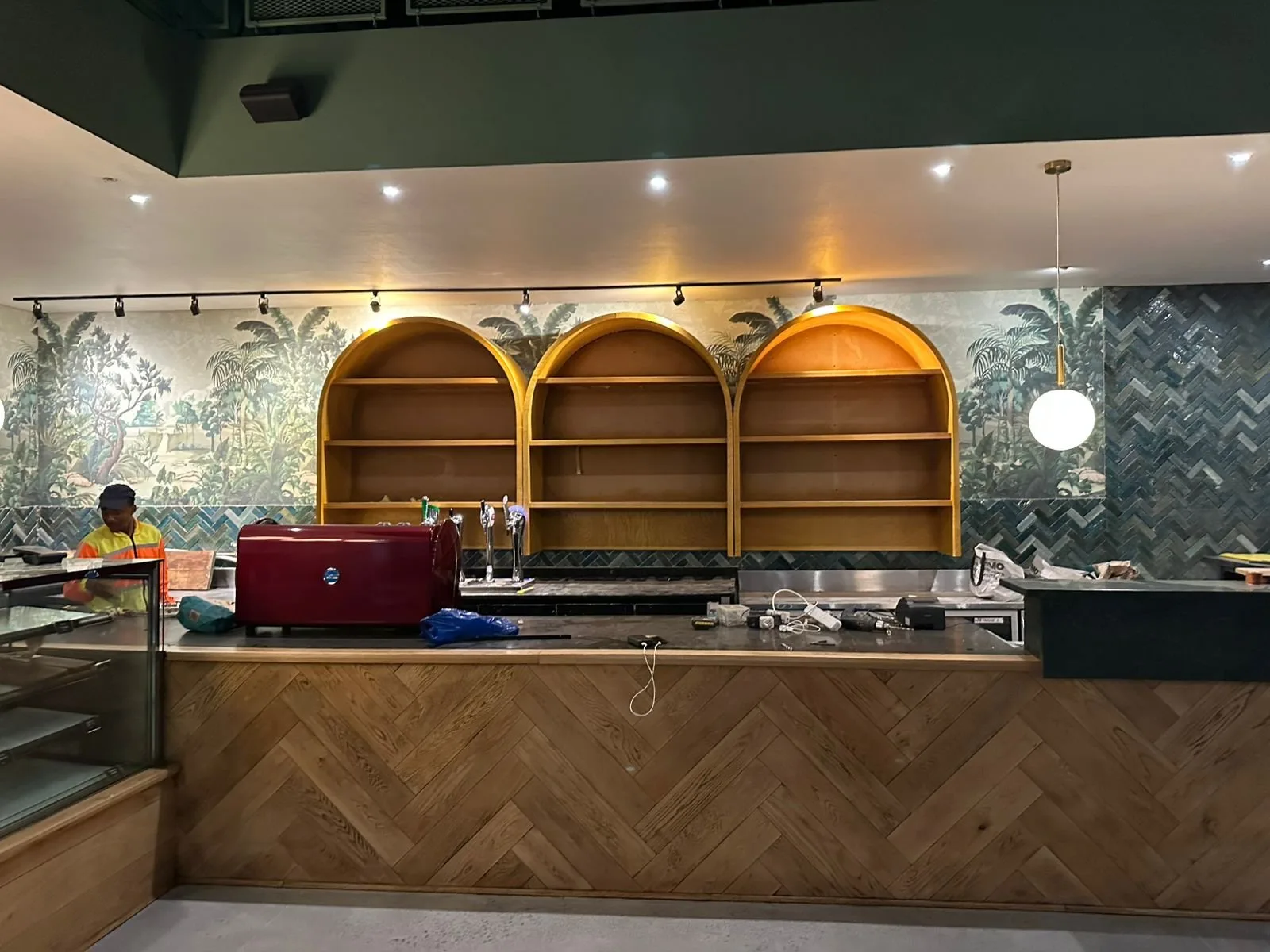 Restaurant bar with arched wooden shelving